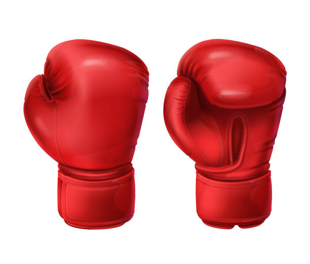Realistic pairs of red boxing gloves Realistic red boxing gloves, pairs of boxing equipment to protecting hands in fist fight. Vector illustration isolated on white background. Sportswear for a kick workout. Symbol of combat, competition boxing gloves stock illustrations