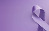 Awareness purple ribbon. Realistic purple ribbon, epilepsy awareness symbol, isolated on violet background. Vector illustration