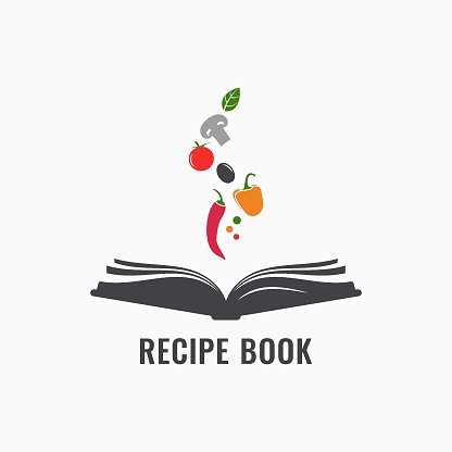 Recipe book with vegetables. Cookbook or book of recipes on white background