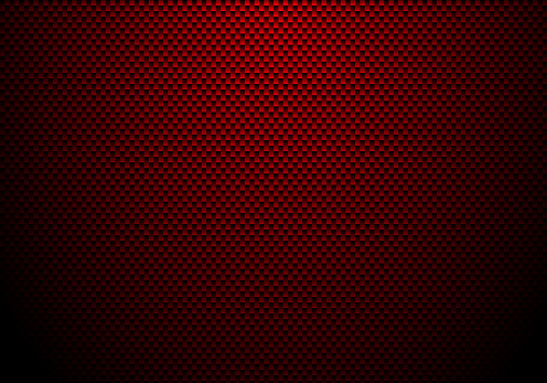 Red carbon fiber background and texture with lighting. Material wallpaper for car tuning or service.