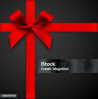 istock Red Gift Bow with Ribbon on a Black Background 1280787140