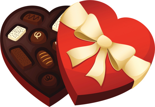 A red, heart shaped chocolate box