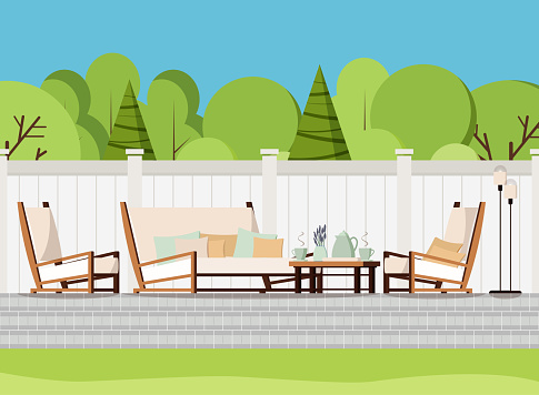 Relaxing porch zone private backyard patio retreat with outdoor country soft sofa, table with cups of tea and flowers, armchairs and lamps