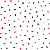 Repeated hearts and footprints of animal. Cute seamless pattern. Vector illustration.