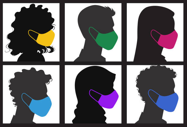 Side view of silhouettes of people wearing multicolored masks