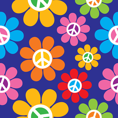 Vectro seamless pattern of colorful retro peace sign flowers on a blue background.
