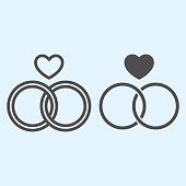 istock Rings line and solid icon. Two crossing circles with heart shape. Wedding asset vector design concept, outline style pictogram on white background, use for web and app. Eps 10. 1205814292