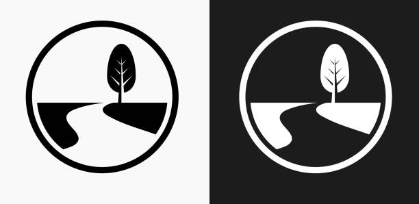 Road Path and Tree Icon on Black and White Vector Backgrounds Road Path and Tree Icon on Black and White Vector Backgrounds. This vector illustration includes two variations of the icon one in black on a light background on the left and another version in white on a dark background positioned on the right. The vector icon is simple yet elegant and can be used in a variety of ways including website or mobile application icon. This royalty free image is 100% vector based and all design elements can be scaled to any size. footpath stock illustrations