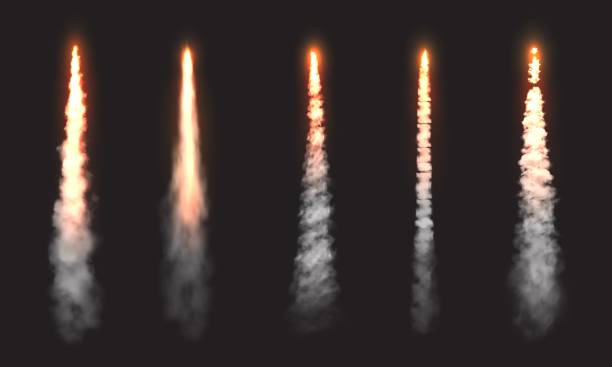 Rocket fire smoke trails, spacecraft launch clouds Rocket fire smoke trails, spacecraft startup launch clouds. Vector space jet fire flames, airplane or shuttle straight contrails in sky, realistic 3d design elements set isolated on black background missile stock illustrations