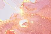 Rose and gold pattern with texture of stone and sparkles. Abstract vector background in alcohol ink technique. Modern paint with glitter. Template for banner, poster design. Fluid art painting