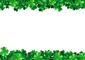 istock Saint Patricks day background with sprayed green clover leaves or shamrocks 1198768942