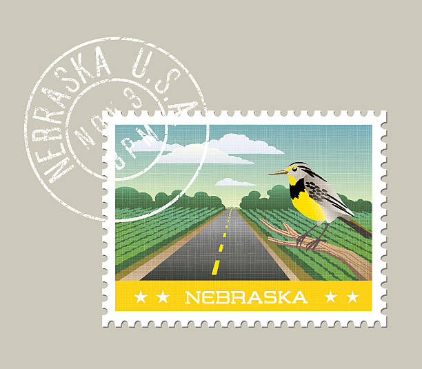 scenic Nebraska farmland and Meadowlark Nebraska postage stamp design. Vector illustration of scenic farmland and Meadowlark. Grunge postmark on separate layer meadowlark stock illustrations