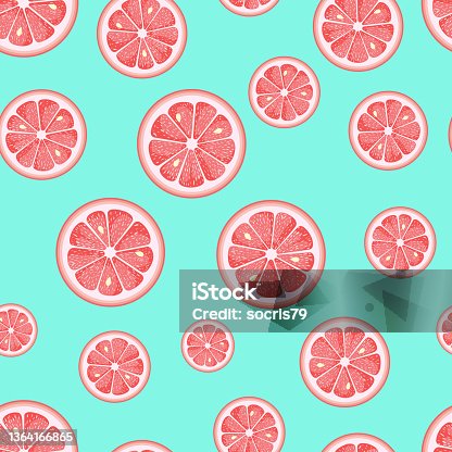 istock Seamless blue background of round grapefruit citrus slices 1364166865