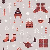 Seamless Christmas pattern. Stylized Christmas gift boxes, snowflakes, knitted hats, socks. Idea for fabric, tablecloth pattern, wrapping paper, gift paper