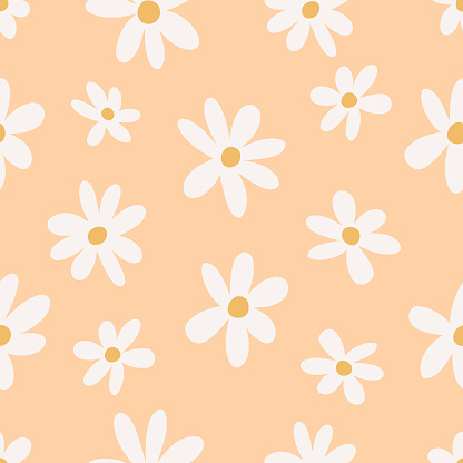 Seamless floral chamomile pattern in trendy boho style on a peach background. Abstract hippie botanical retro pattern in 70s style. Contemporary design for wrapping paper, covers and fabric.