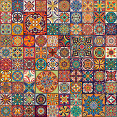 Seamless pattern with decorative mandalas. Vintage mandala elements. Colorful patchwork