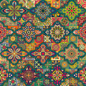 Seamless pattern with decorative mandalas. Vintage mandala elements. Colorful patchwork