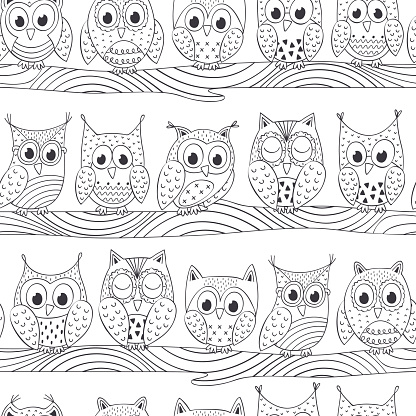 seamless pattern with funny owls on branch black and white