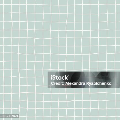 istock Seamless plaid pattern with white hand drawn doodle lines on a blue background. Abstract boho texture in retro style for wrapping paper, covers and fabric. 1319217421
