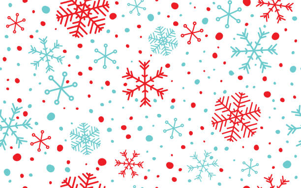 白い背景を持つシームレスな青と赤の抽象的な雪片。