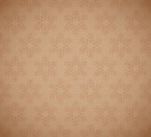 A seamless pattern of snowflakes on textured brown paper. EPS10 vector illustration, global colours, easy to modify.