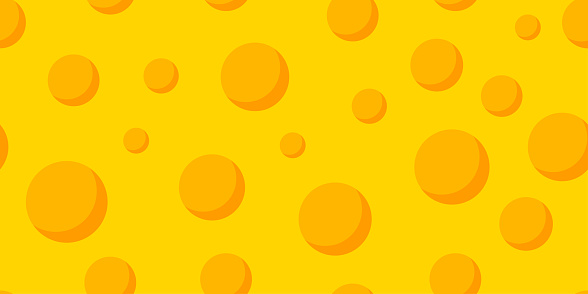 Seamless yellow cheese pattern. Cheese with round holes