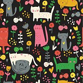 Cute seamless background with funny kittens, flowers and butterflies in cartoon style