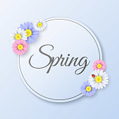 Seasonal Spring Label. Paper round banner with multicolored flowers. Ladybug on a daisy. Light blue sticker. Realistic flowers. Calligraphy text. Vector illustration
