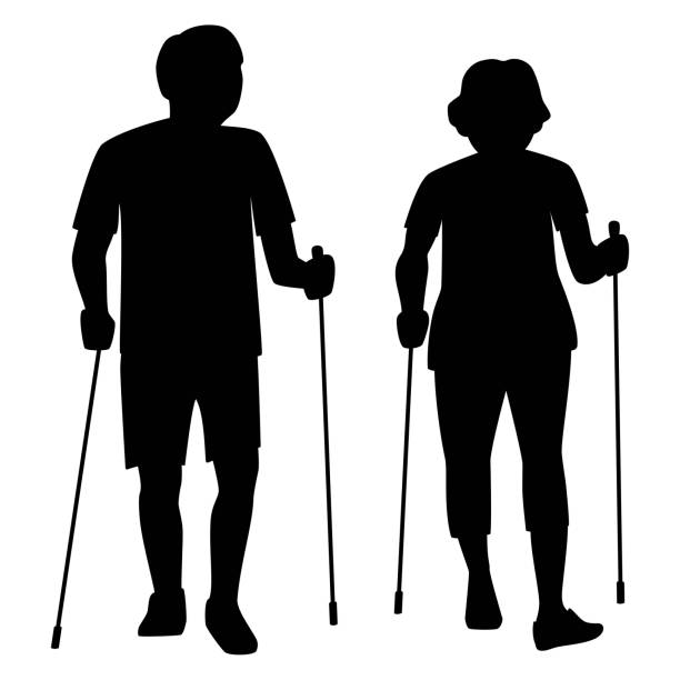 Silhouette Of The Old Couple Walking Togetherのストックイラスト素材