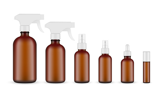 Set of Amber Cosmetic Bottles Mockups Isolated on White Background
