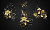 Set of bouquets of black and gold jewelry orchids, decorated with decorative twigs on dark background.