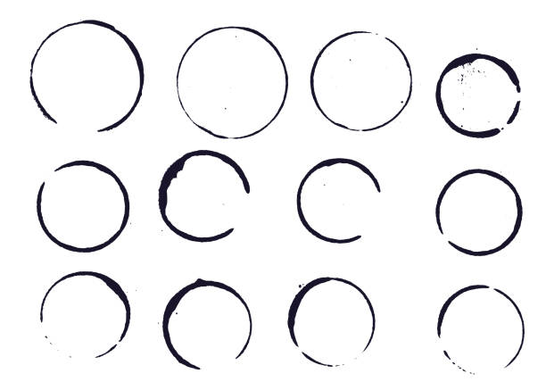 Set of black round stains and blots Set of black round stains and blots on white background. Vector illustration. Elemens for design."n stained stock illustrations
