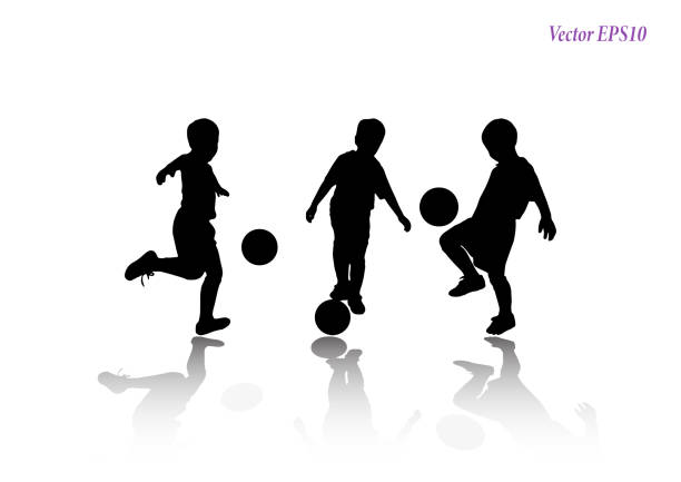 Set of child playing football at studio. Isolated on white background. Soccer players silhouettes of kids collection. Full body of child in sportswear playing football. Different poses. Isolated on white background. Vector illustration. EPS10 soccer silhouettes stock illustrations