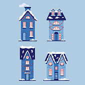 Set of christmas snowy houses. Blue new year vector houses in flat style