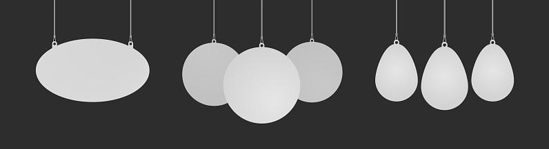 Set of circle, ellipse and egg shaped danglers hanging from ceiling realistic mockup