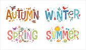 istock Set of decorative, illustrated words autumn, winter, spring and summer. 1177109161