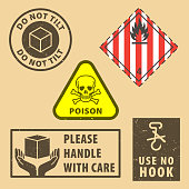 istock Set of fragile sticker use no hook and case icon packaging symbols sign, do not tilt and handle with case rubber stamp on cardboard background. Use on package. 1399367586