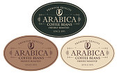Vector set of labels for freshly roasted coffee beans. Coffee labels with coffee bean in oval frame in retro style with inscription Arabica.