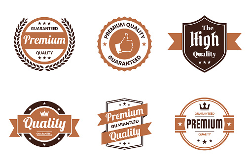 Set of "Quality" Brown Badges and Labels - Design Elements