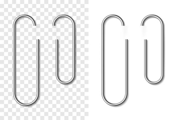Set of silver metallic realistic paper clip Set of silver metallic realistic paper clip on white and transparent background. Paperclips with soft shadow. Template for your design letter document stock illustrations