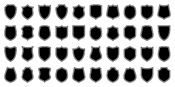 Set of various vintage shield icons. Black outlined heraldic shields. Protection and security symbol, label. Vector illustration