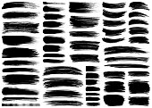 Set of vector brush strokes, lines and design elements. Isolated brush smears black on white. Hand drawn paint grunge brush strokes.