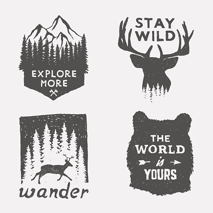 set of wilderness hand drawn typography posters, emblems and quotes. artworks for hipster wear. vector Inspirational illustration