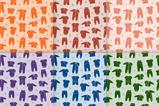 Set seamless pattern with baby clothes. Vector.