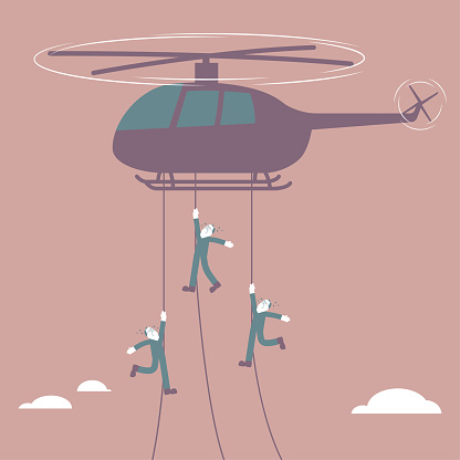 Several men airborne through a helicopter. The background is brown.