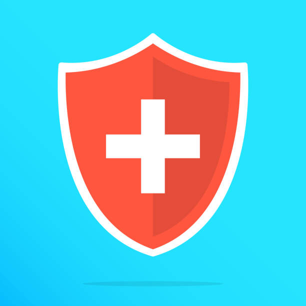 Shield with cross icon. Red shield with white cross. Vector flat icon Shield with cross icon. Red shield with white cross. Vector flat icon immune system illustrations stock illustrations