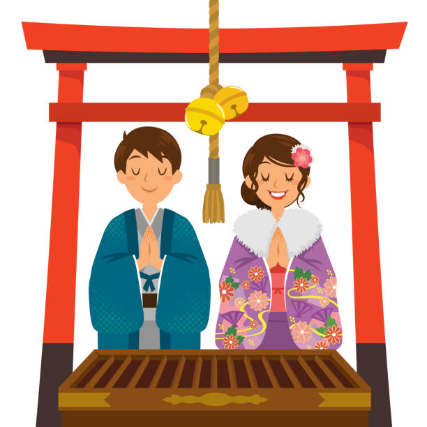 Shrine visit on the Japanese New Year Hatsumode tradition Japan. Young Japanese couple wearing kimono praying in a shrine under a red torii gate on New Year. shrine stock illustrations