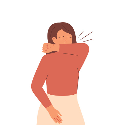 Sick woman sneezes and coughs covering her mouth with her elbow.