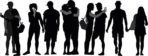 Silhouette Crowd Of Couples In Love A vector silhouette illustration of young couples showing affection. selfie silhouettes stock illustrations