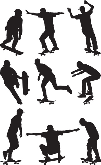 Silhouette of men skateboarding